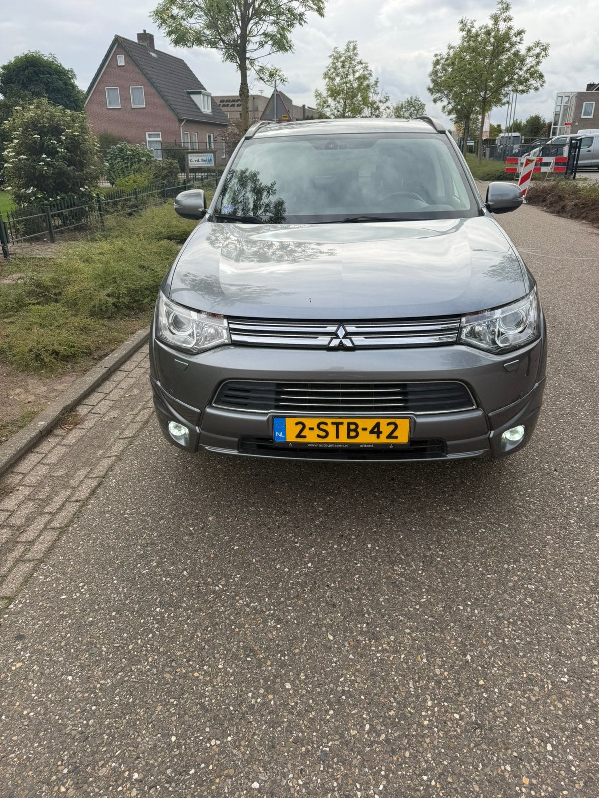Mitsubishi Outlander 2.0 Dohc Mivec Phev 203pk 4WD CVT 5P, Auto's, Outlander, Zwart, 4 cilinders, Vierwielaandrijving