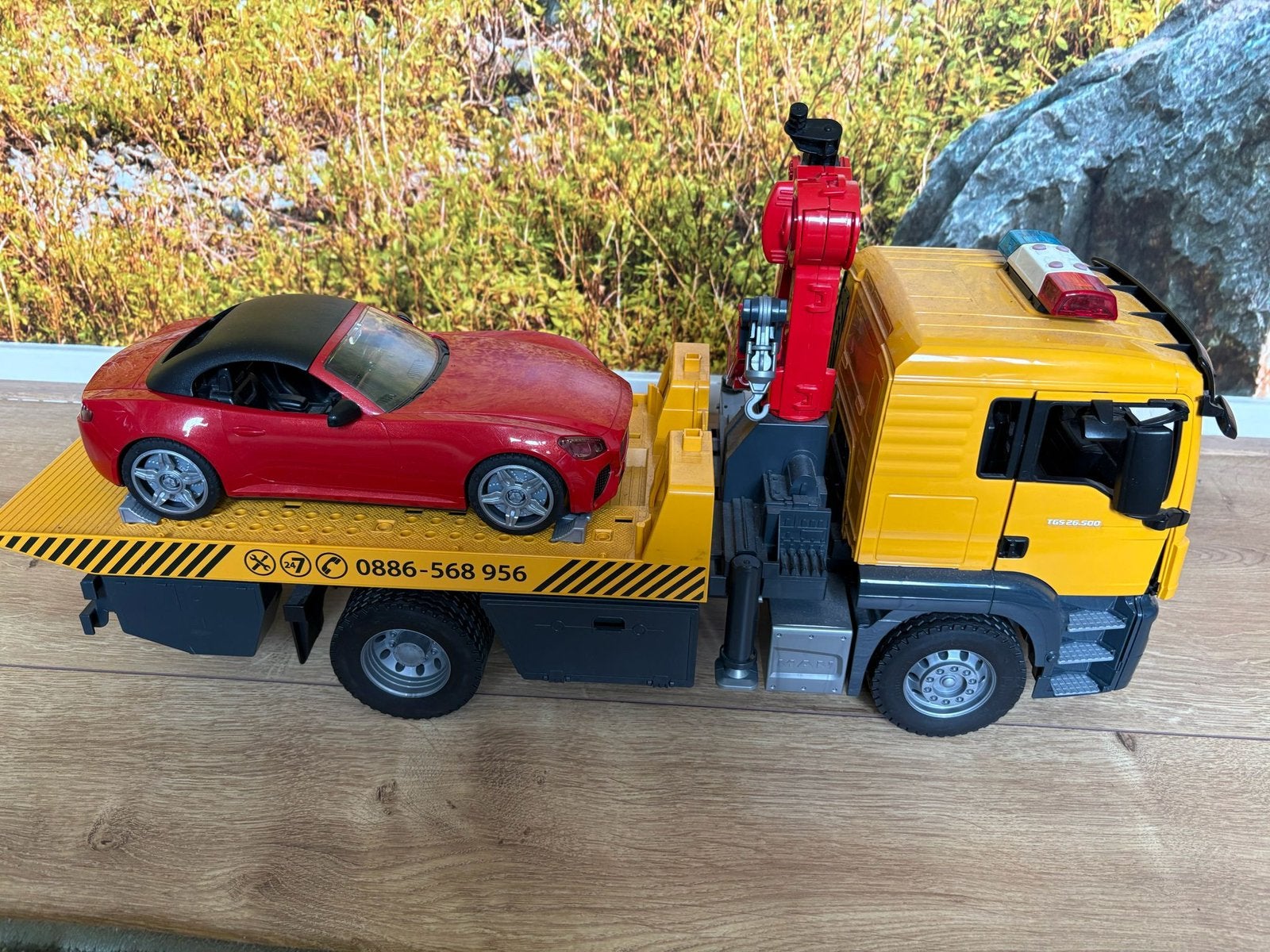 Bruder takelwagen sleepwagen met sportwagen, Kinderen en Baby's, Speelgoed | Speelgoedvoertuigen, Ophalen of Verzenden, Zo goed als nieuw