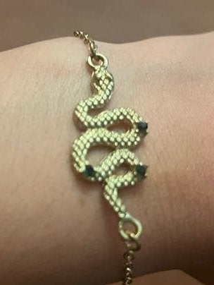 Gouden rvs slang armband met zwarte steentjes, Overige materialen, Ophalen of Verzenden, Zo goed als nieuw, Met bedels of kralen