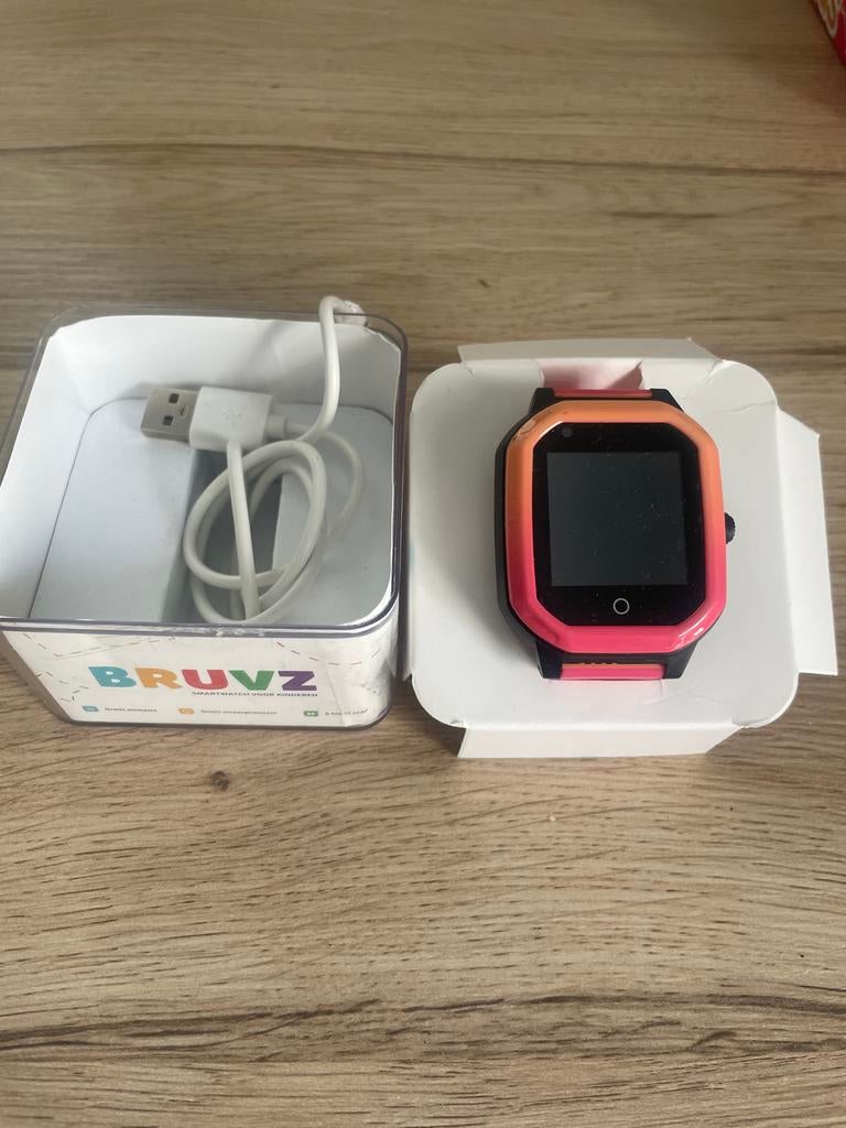 BRUVZ Smartwatch voor Kinderen - Roze/Oranje, Sieraden, Tassen en Uiterlijk, Horloges | Kinderen, Ophalen of Verzenden, Zo goed als nieuw
