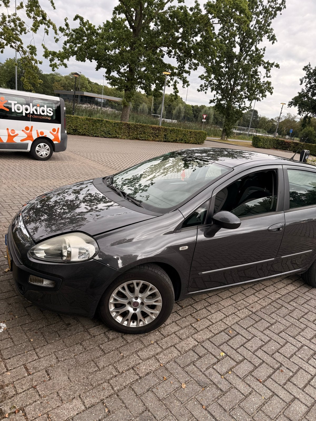Fiat Punto 1.3 Multijet 62KW 5DR 2011 Grijs, Auto's, Fiat, Voorwielaandrijving, Euro 5, 28 km/l, 4 cilinders