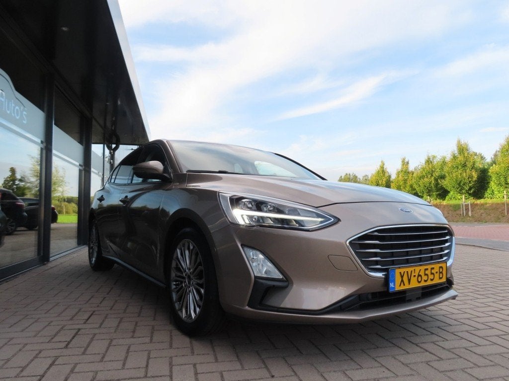 Ford FOCUS 1.0 Titanium Business Ecc Cruise Navi Trekhaak 20, 125 pk, Gebruikt, Euro 6, Origineel Nederlands