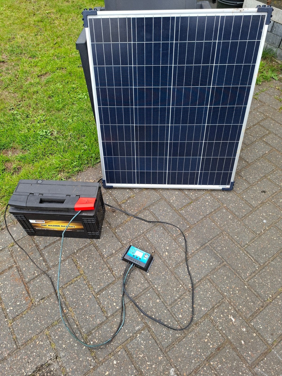 Zonnepaneel met laadregelaar en 110Ah accu, Ophalen