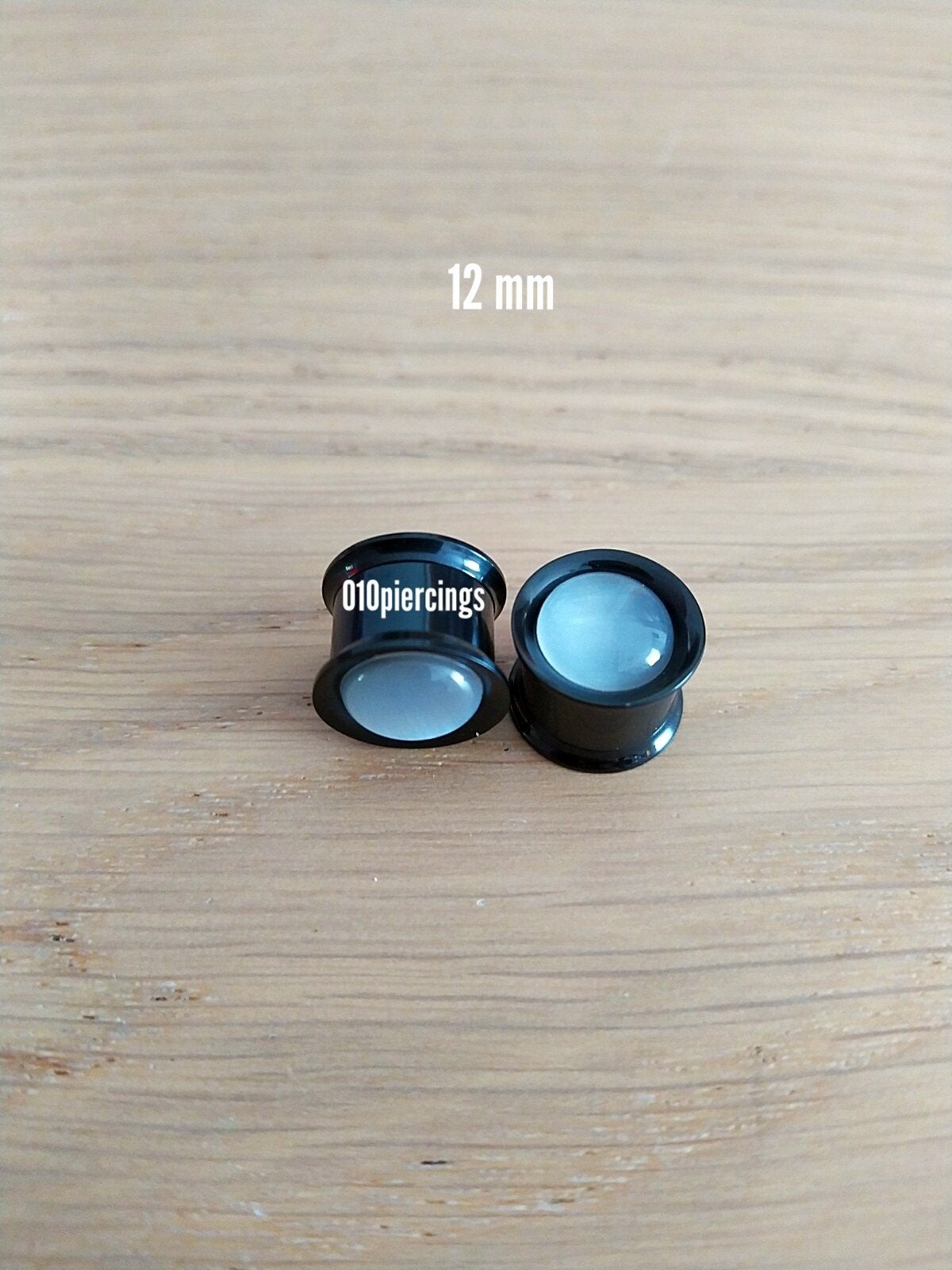 Nieuwe pluggen, tunnels. Staal. Opaal. 12 mm., Ophalen of Verzenden, Zo goed als nieuw, Staal, Oor- of Traguspiercing
