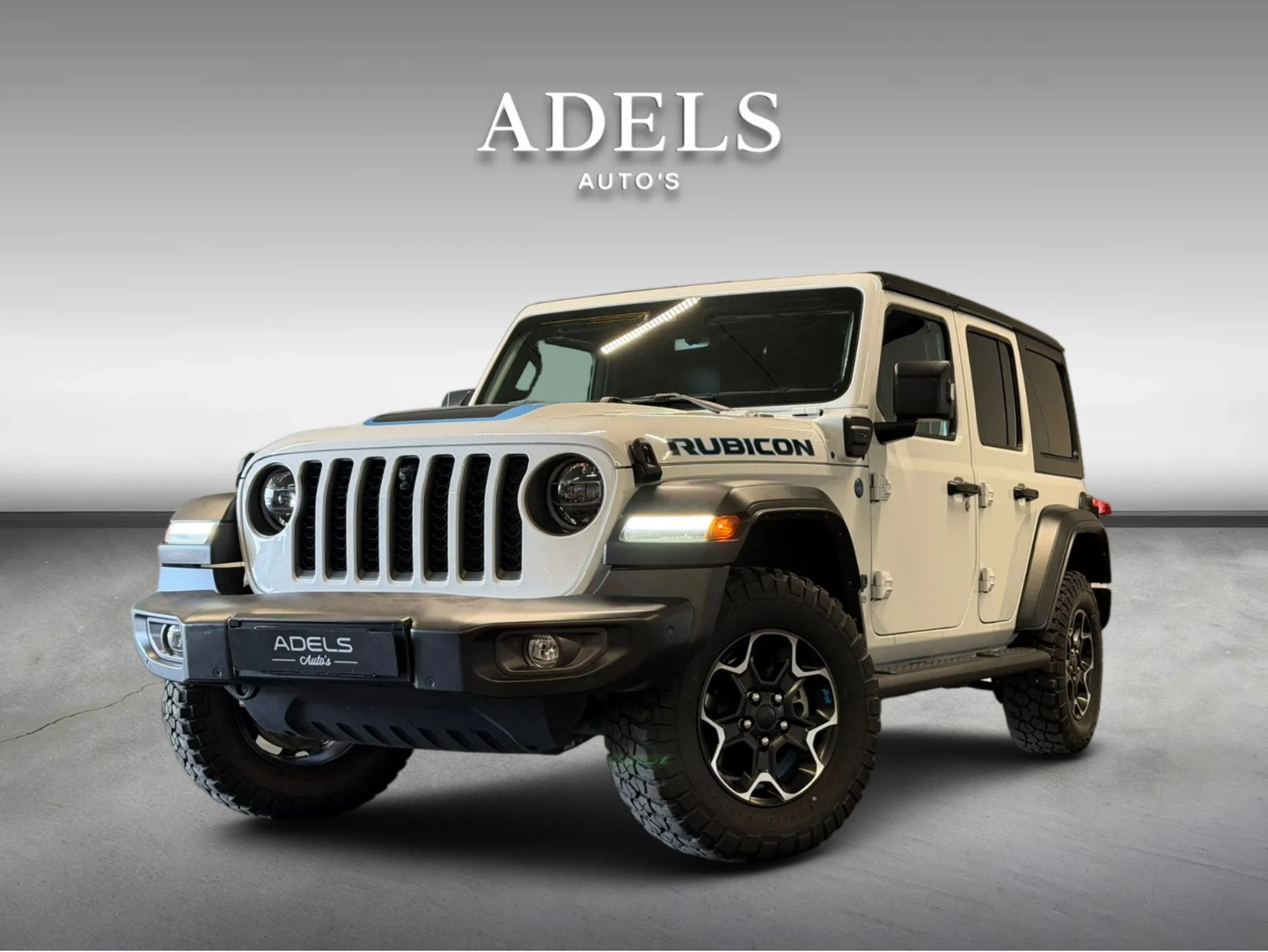 Jeep Wrangler Unlimited 4xe 380 Rubicon Treeplanken Camera A, Auto's, Zwart, 4 cilinders, Cabriolet, Bedrijf