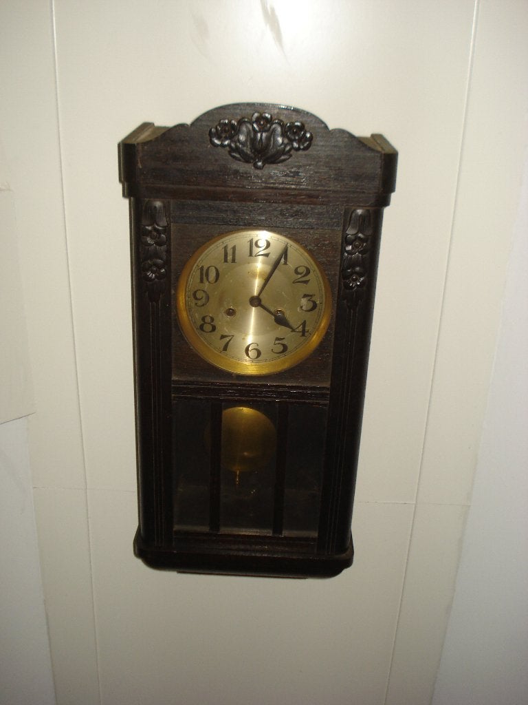 Antieke Franse wandklok met slingeruurwerk en slagwerk., Ophalen