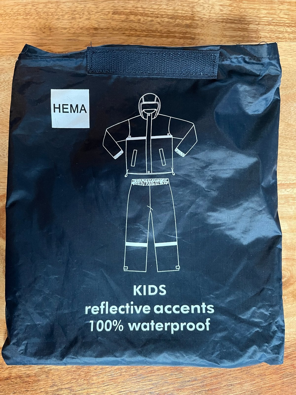 Hema Kids Regenpak - 100% waterdicht met reflecterende accen, Caravans en Kamperen, Ophalen of Verzenden, Zo goed als nieuw, Regenbroek
