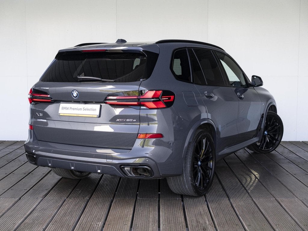 BMW X5 xDrive50e | M Sportpakket Pro | Innovation Pack | Com, Auto's, BMW, Gebruikt, 2395 kg, Met garantie (alle), Parkeerassistent