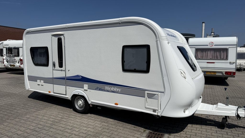 Hobby Prestige 495 UFE bouwjaar 2010 met voortent en luifels, Schokbreker, Rondzit, Hobby, Bedrijf