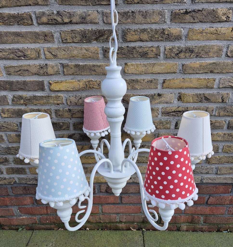 Te Koop! Een z.g.a.n kandelaar met mooie lampenkapjes., Ophalen of Verzenden, Zo goed als nieuw, Overige materialen, E14 (klein)