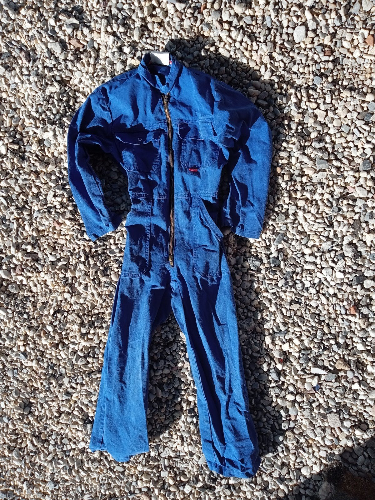 Stevige blauwe overall, maat 140 - Ideaal voor buitenspelen!, Ophalen, Gebruikt, Onbekend, Jongen of Meisje