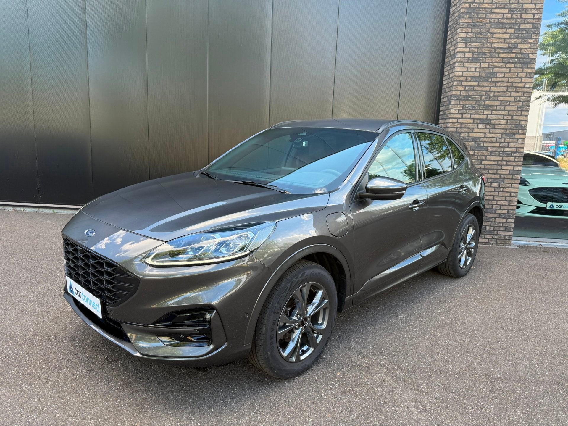 Ford Kuga 2.5 225pk PHEV ST-Line X Navi, B&O, AGR, Camera's,, Dealer onderhouden, Gebruikt, Zwart, 4 cilinders