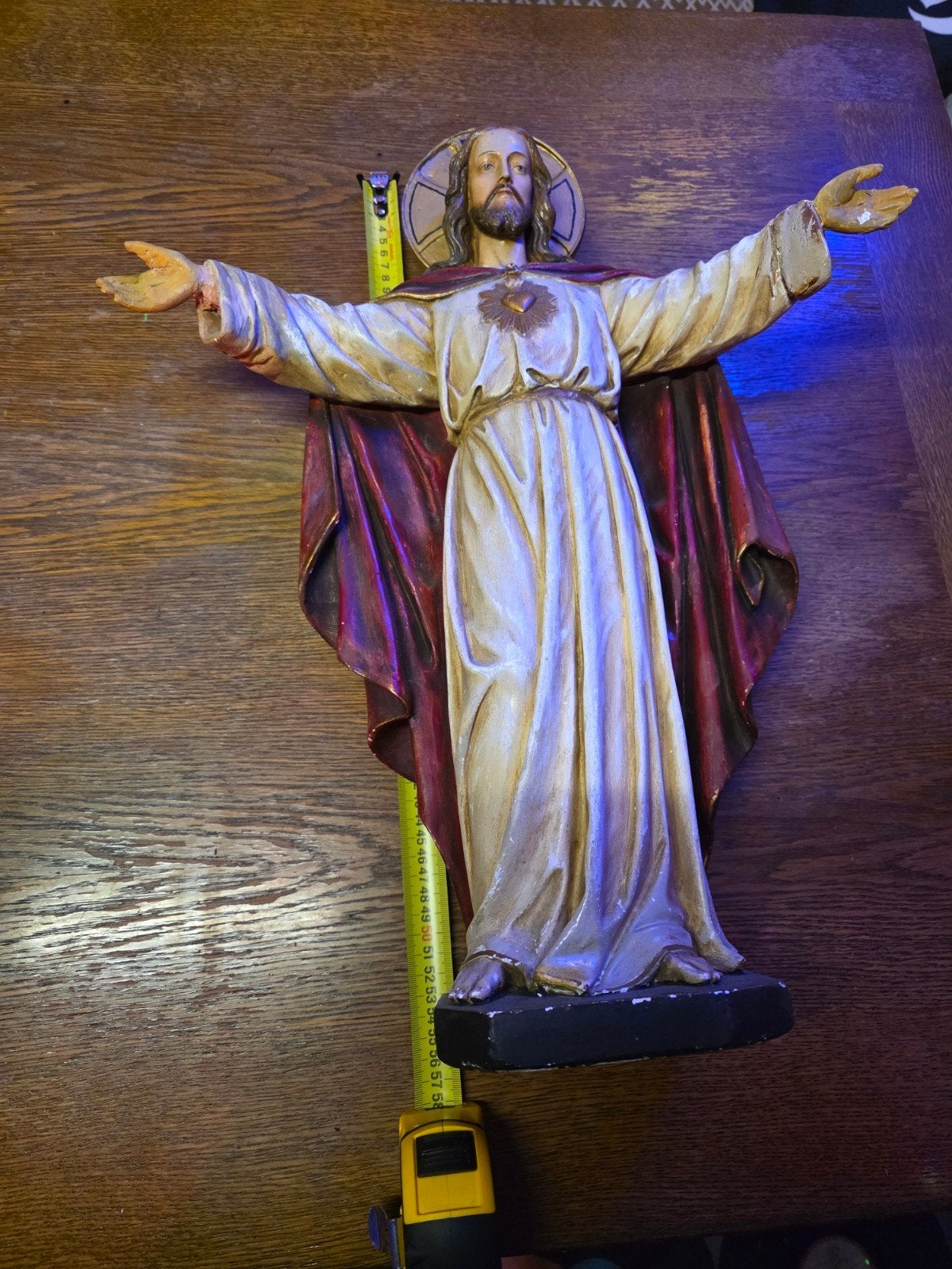 Beeld van Jezus Christus met open armen, Ophalen