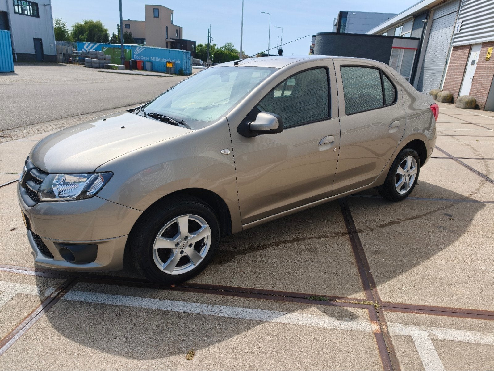 Dacia Logan 1.2 Sedan 2014 navi apk airco pdc cruis velgen, Voorwielaandrijving, Euro 5, Stof, 74 pk