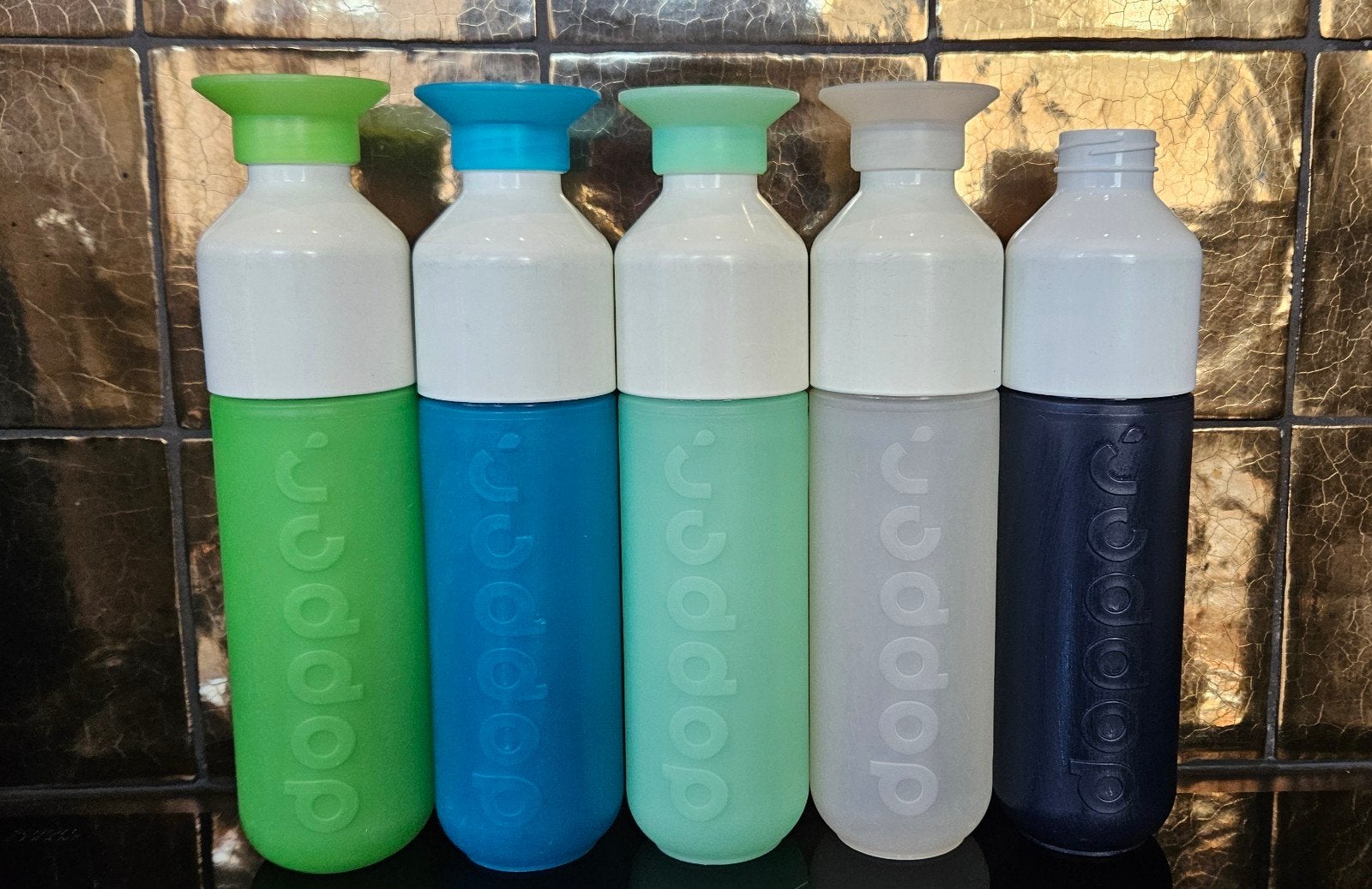 Dopper waterflessen in diverse kleuren - Zo goed als nieuw, Overige typen, Kunststof, Ophalen of Verzenden, Zo goed als nieuw