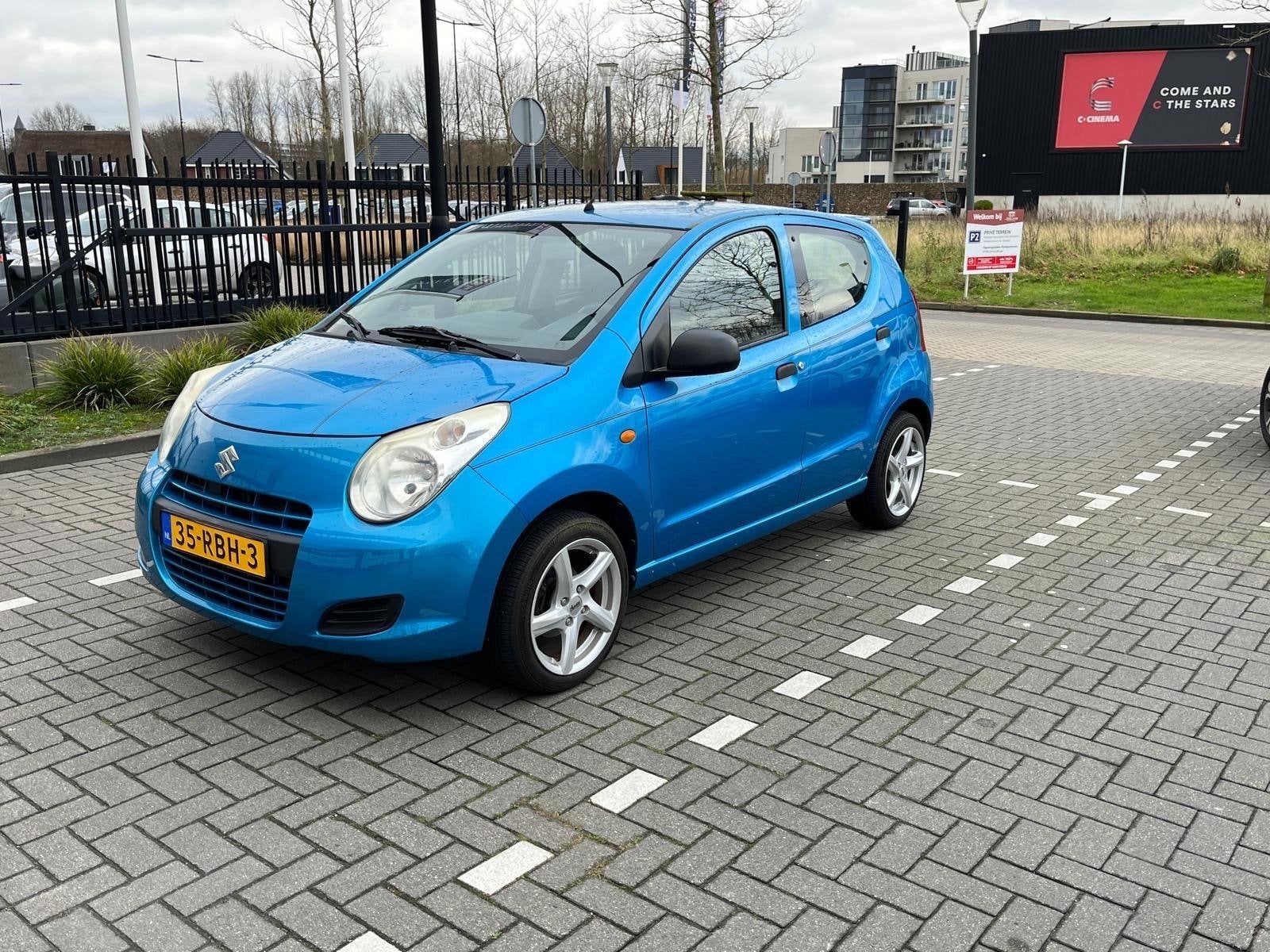 Suzuki Alto 1.0 2011 Blauw, Auto's, Voorwielaandrijving, 200 kg, Origineel Nederlands, Handgeschakeld