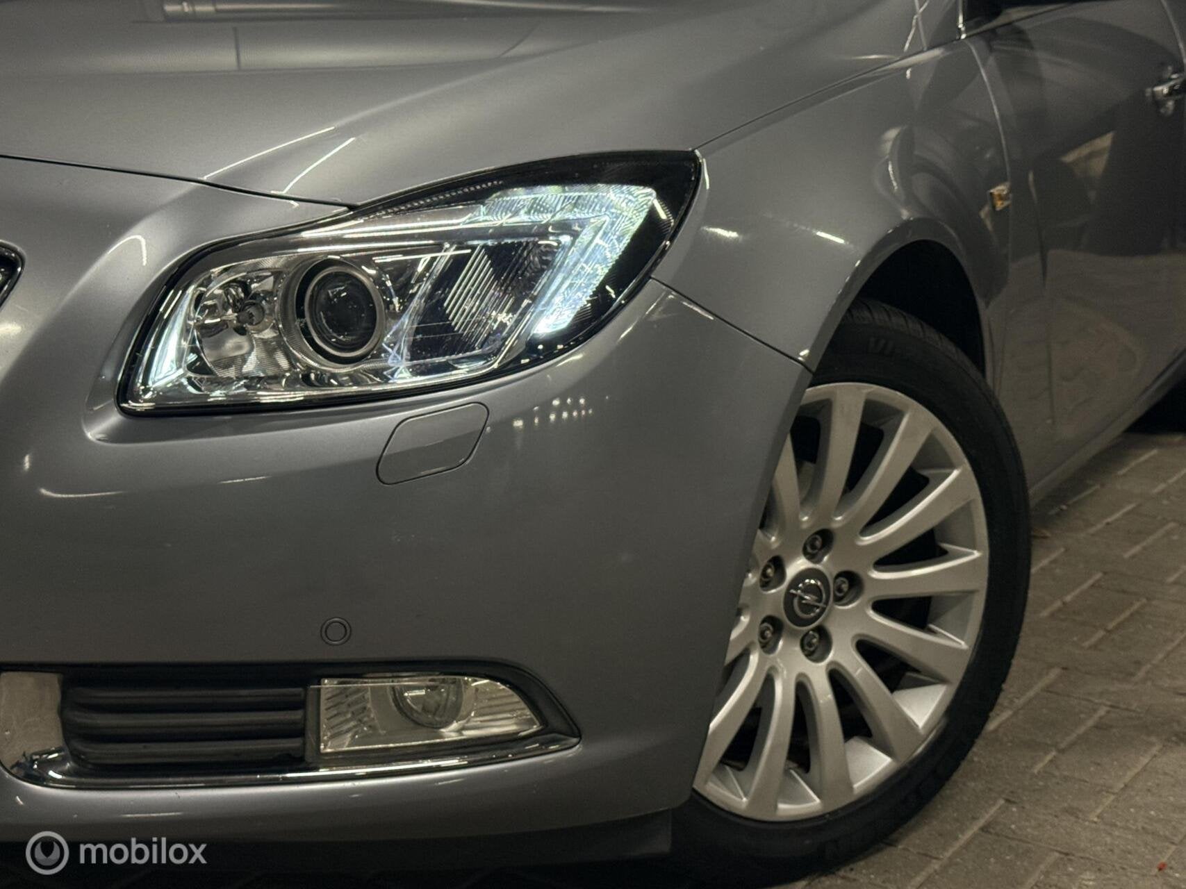 Opel Insignia 1.8 Cosmo/zeer netjes/trekhaak/parkeersensoren, Auto's, Euro 5, Gebruikt, 4 cilinders, 1796 cc