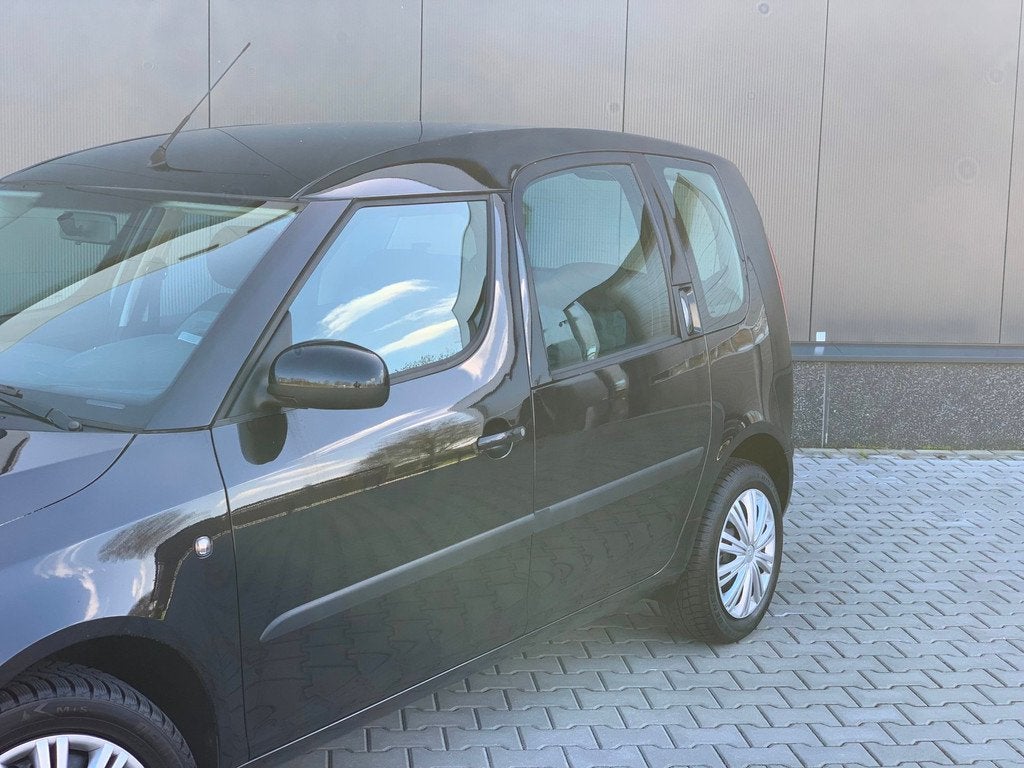 Skoda Roomster 1.4-16V Navigator | AIRCO | NIEUWE APK, Voorwielaandrijving, Gebruikt, Zwart, 4 cilinders
