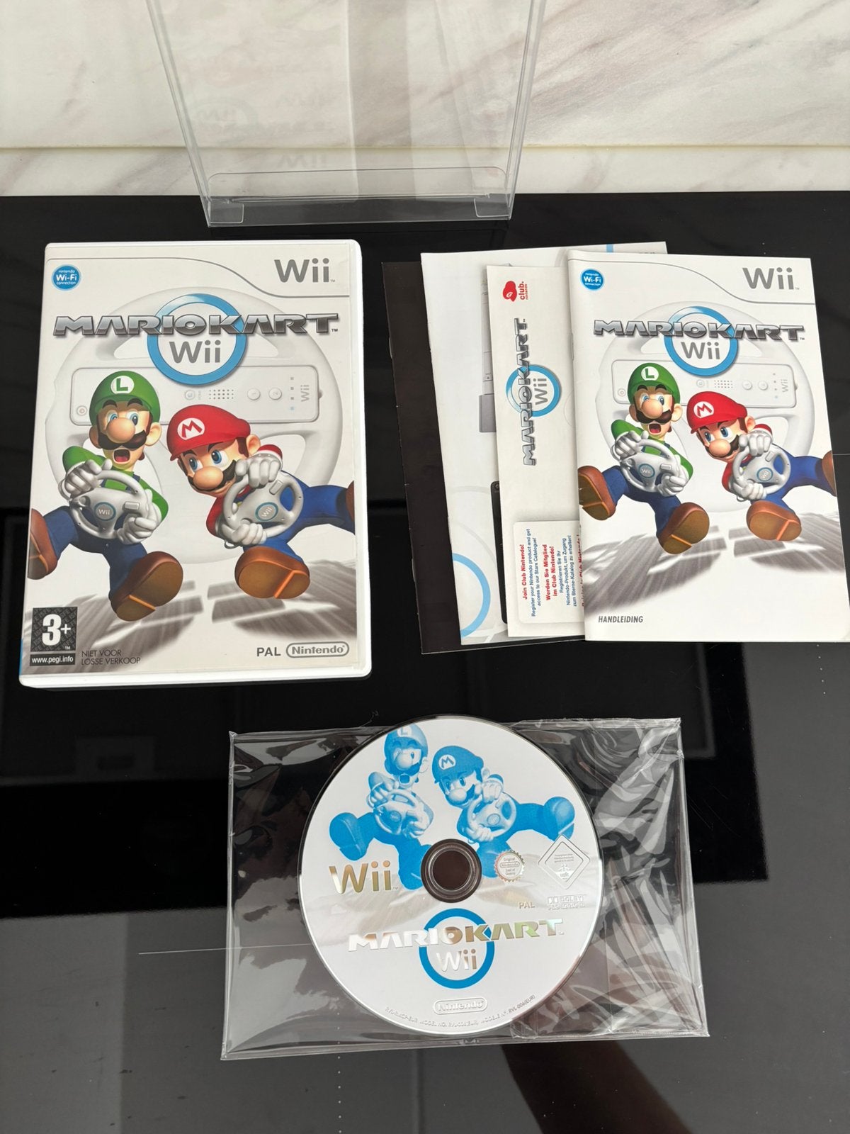 Nintendo Wii Mario Kart Wii, Spelcomputers en Games, Games | Nintendo Wii, Racen en Vliegen, Ophalen of Verzenden, Zo goed als nieuw