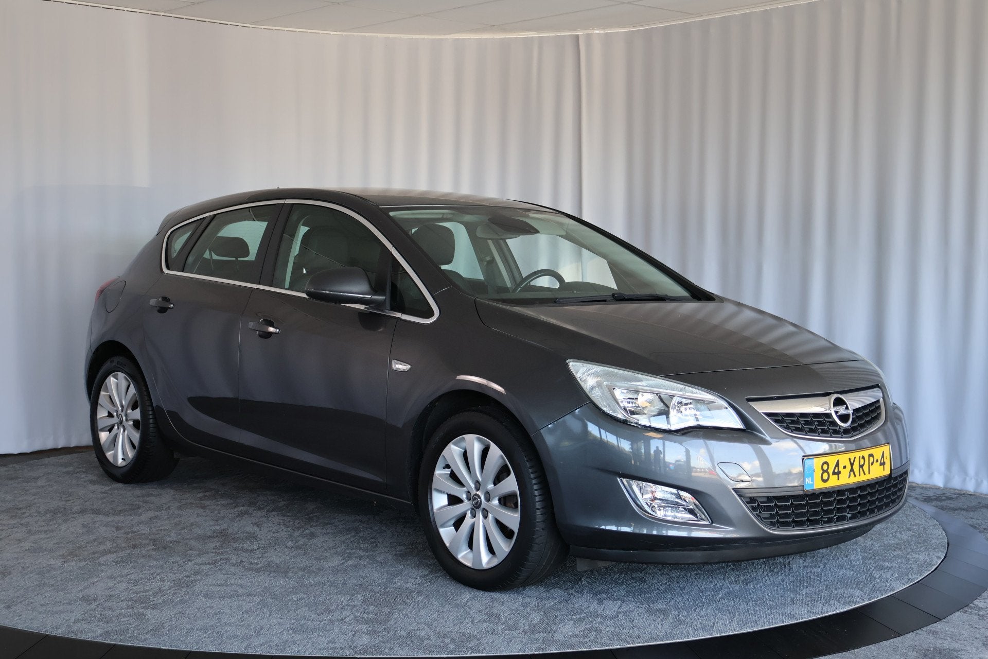 Opel Astra 1.4 Turbo Cosmo, PDC, Navi, Trekhaak (bj 2012), Auto's, Voorwielaandrijving, Euro 5, Stof, Gebruikt