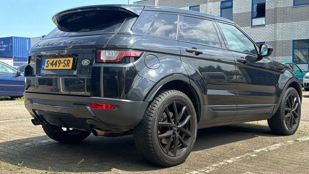 Land Rover Range Rover Evoque 2.0 Si4 Urban Series SE, Auto's, Automaat, 4 cilinders, Leder en Stof, Zwart