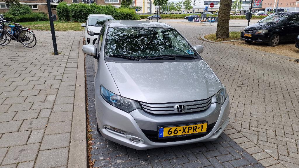 Honda Insight 1.3 Hybrid AUT 2012 Grijs, 4 cilinders, Origineel Nederlands, Grijs, 22 km/l