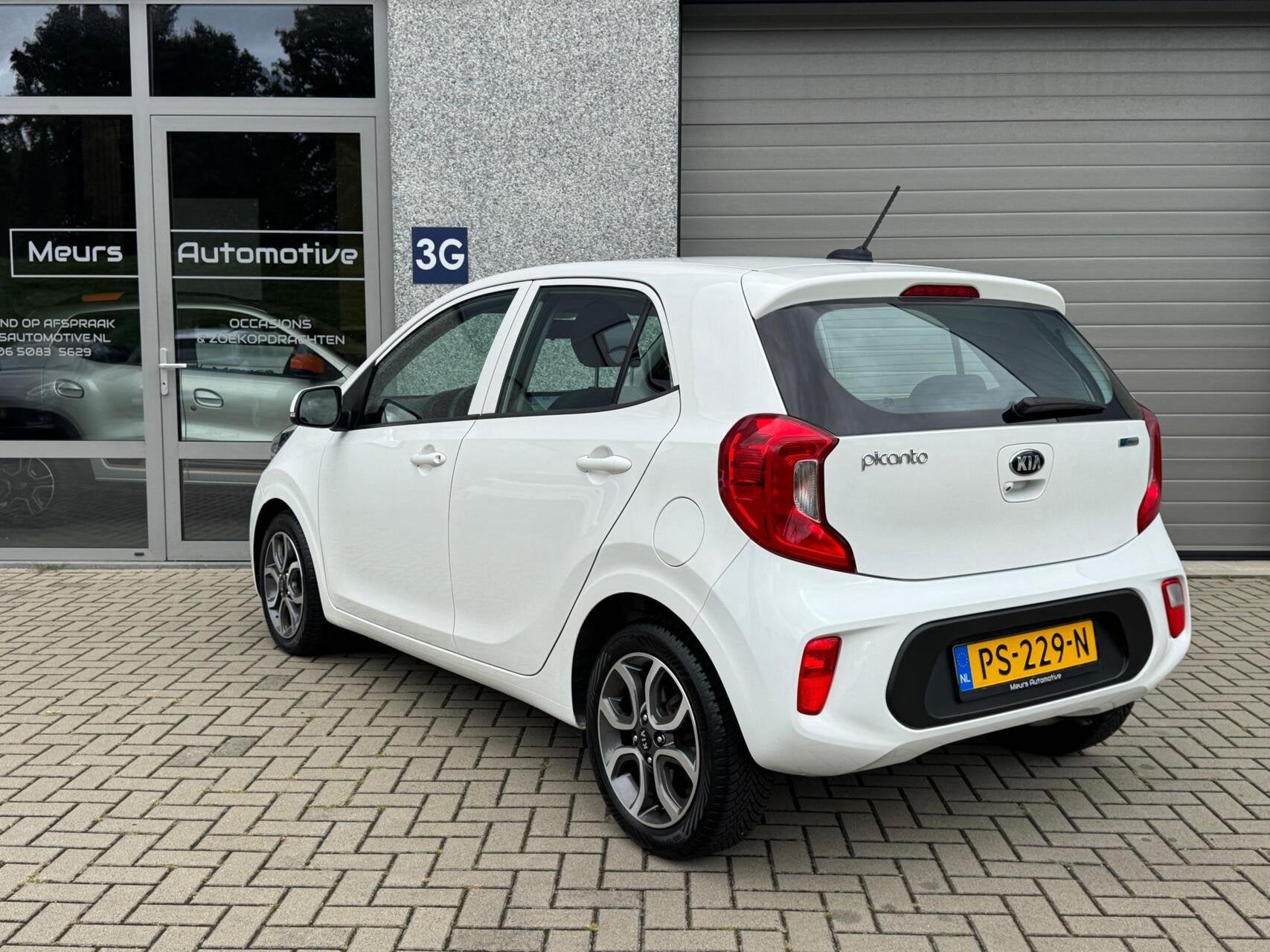Kia Picanto 1.0 CVVT DynamicPlusLine Cruise/Camera/Navi/CarP, Auto's, Stof, Gebruikt, 4 stoelen, Wit