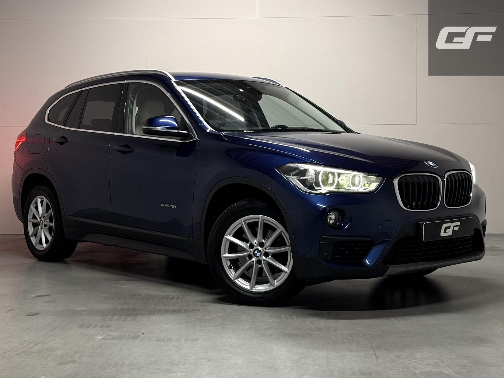 BMW X1 sDrive18i High Executive Leer Navi Cruise Trekh. NAP, Gebruikt, Met garantie (alle), Blauw, Leder