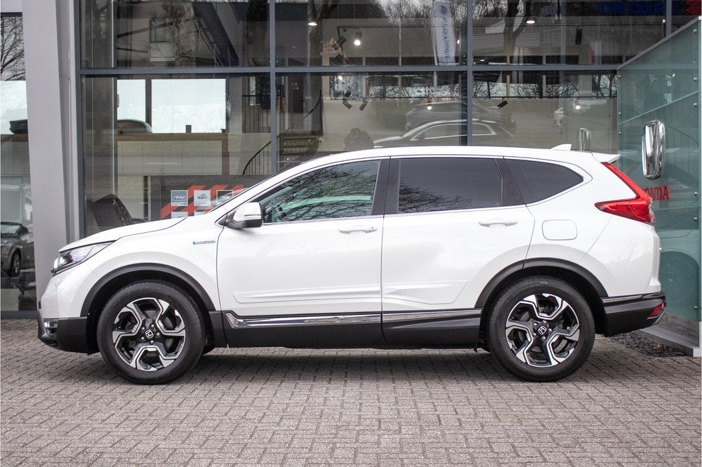 Honda CR-V 2.0 Hybrid Elegance - Dealer ond. | Andrauto/Appl, 12 maanden, Stof, Gebruikt, 4 cilinders