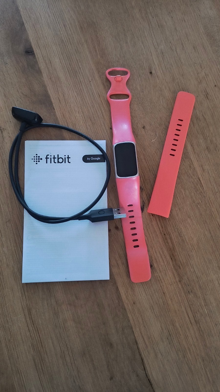 Fitbit met lader en reserve polsbandje, Gebruikt, Oranje, Ophalen of Verzenden, Fitbit