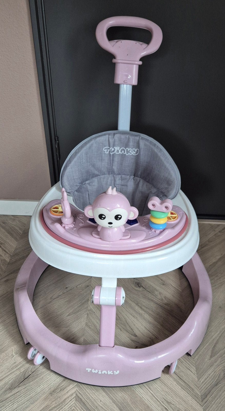 Roze Twinky Baby Loopstoel met Duwstang en Speelgoed, Ophalen, Zo goed als nieuw