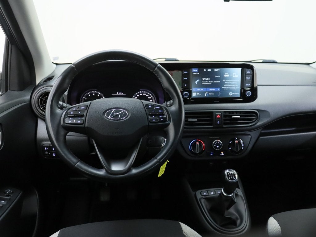 Hyundai i10 1.0 Comfort 5-zits | Carplay | Stoelverwarming |, 12 maanden, Stof, 23 km/l, Bedrijf