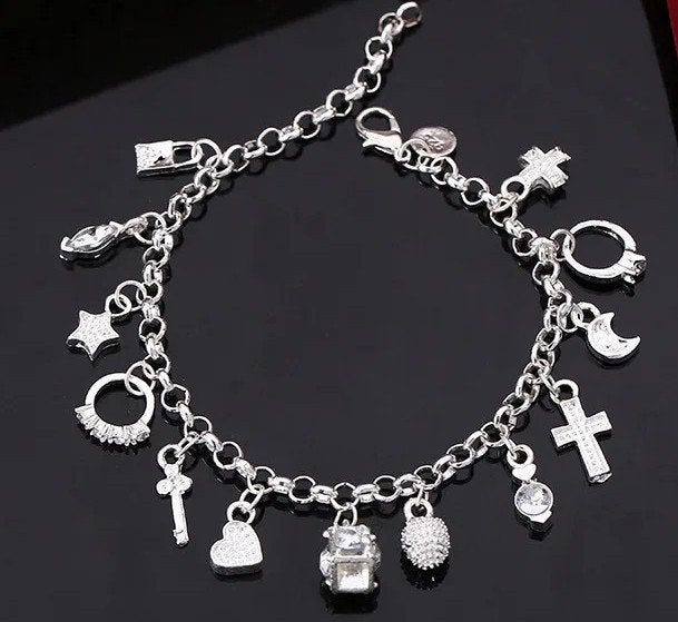 Prachtige nieuwe zilver bedelarmband met diverse hangers, Sieraden, Tassen en Uiterlijk, Armbanden, Overige materialen, Nieuw