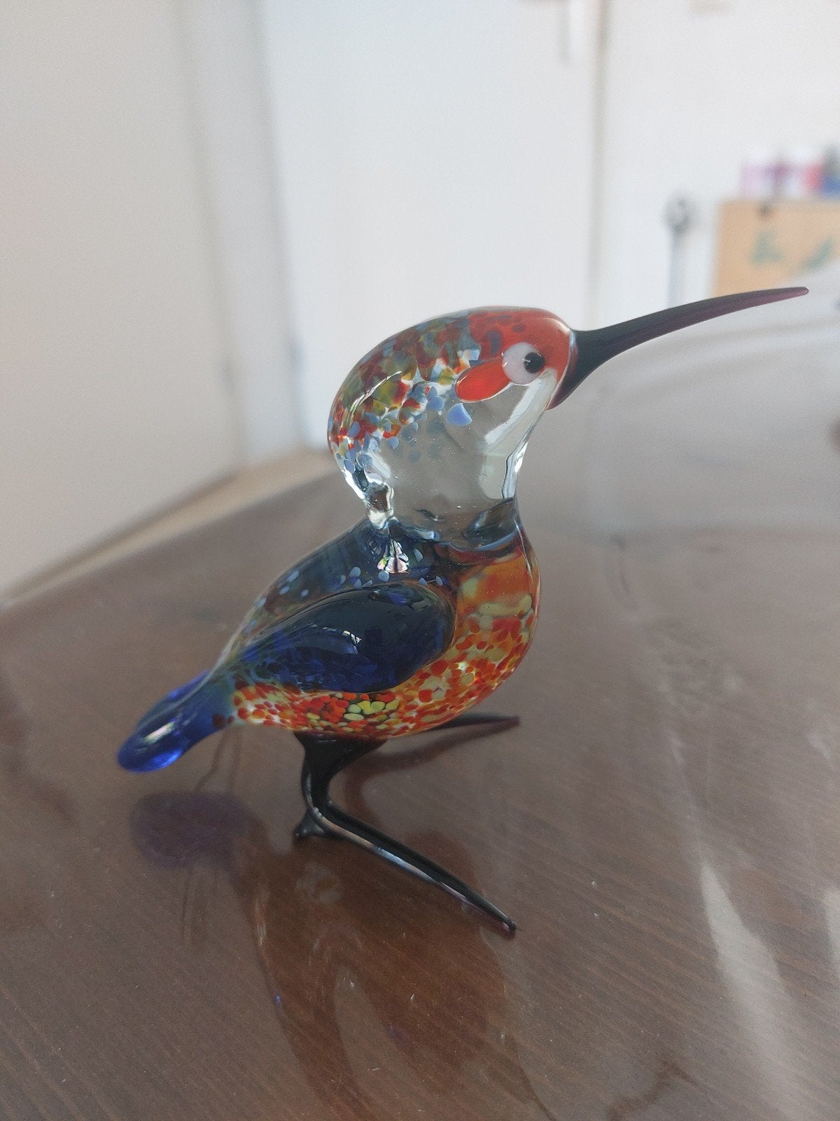 ijsvogel van glas, Ophalen