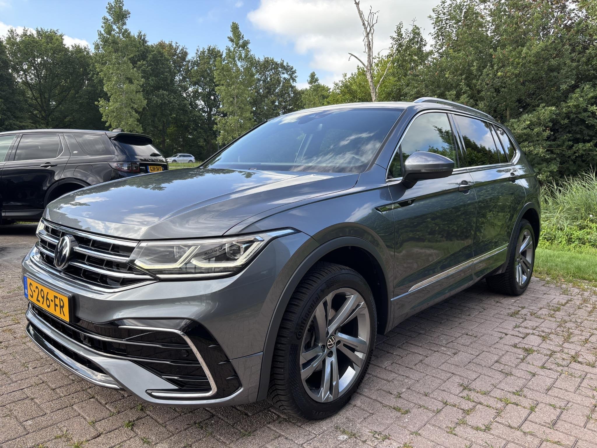 Volkswagen Tiguan Allspace 1.5 TSI R-Line Business+ 7p. 150, Auto's, Volkswagen, Stof, Euro 6, 4 cilinders, 150 pk