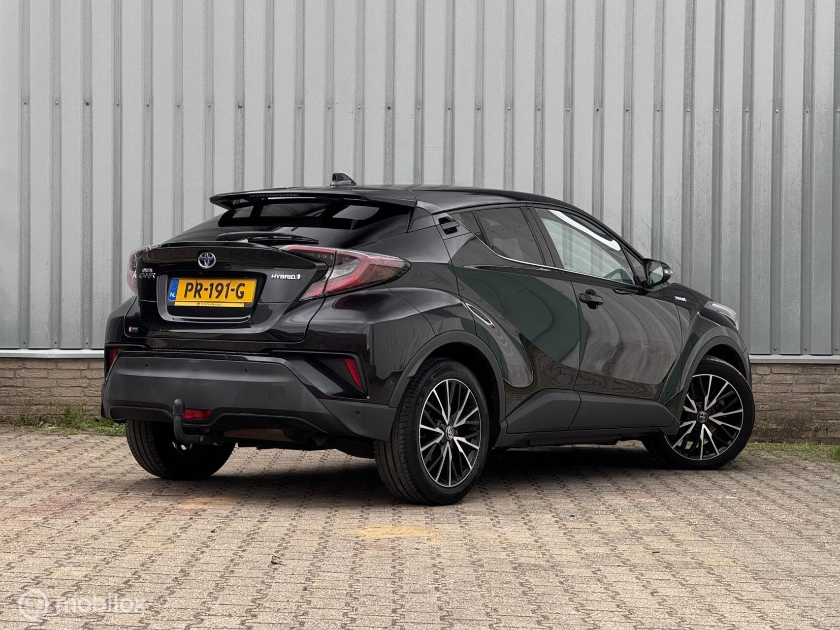 Toyota C-HR 1.8 Hybrid Premium AUT | JBL | Stuur/Stoelverw., 725 kg, Euro 6, 4 cilinders, Automatische klimaatregeling