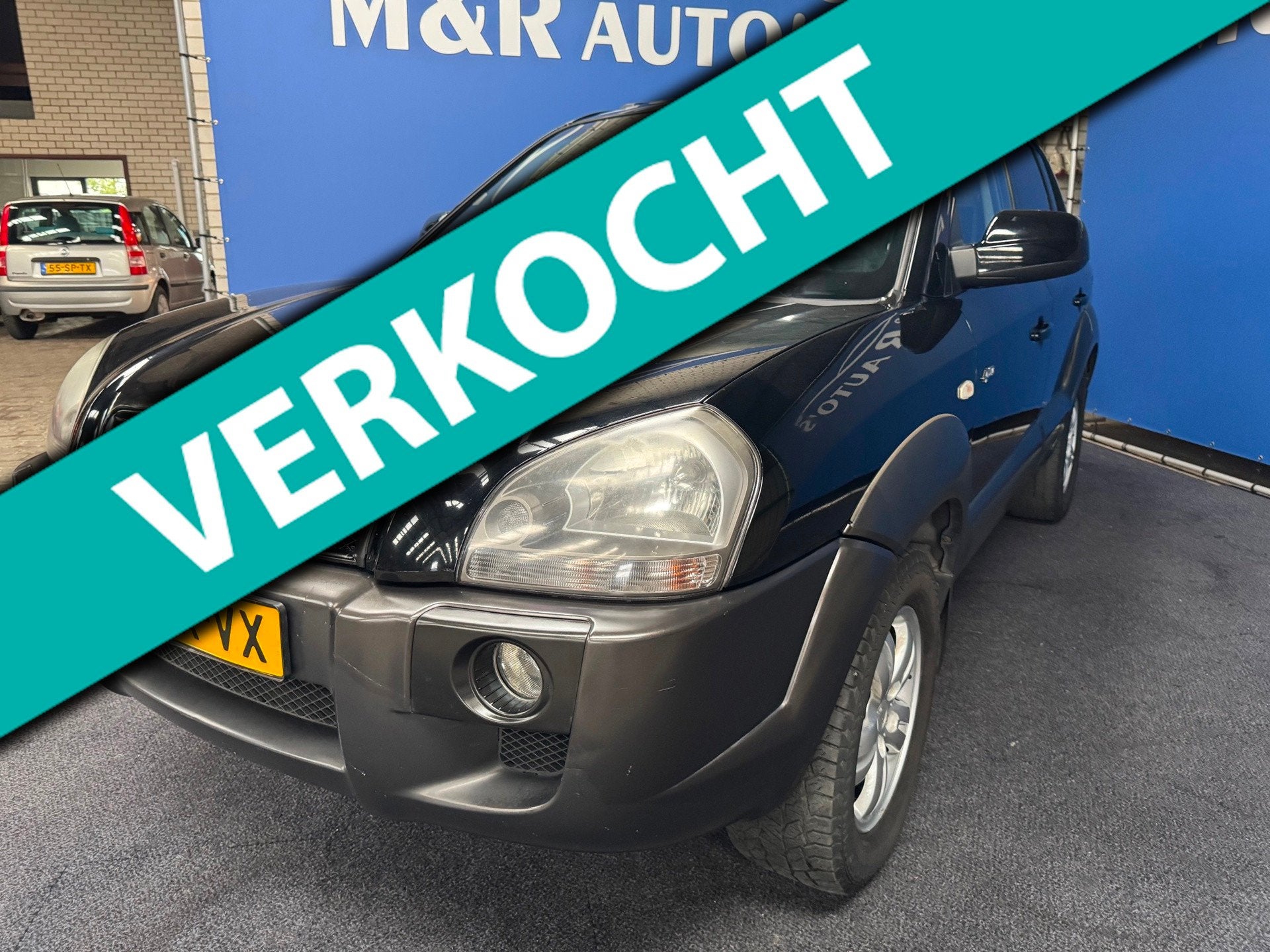 Hyundai Tucson 2.7i V6 4WD Style Automaat met Nieuwe APK, Auto's, Automaat, Gebruikt, 2656 cc, Zwart