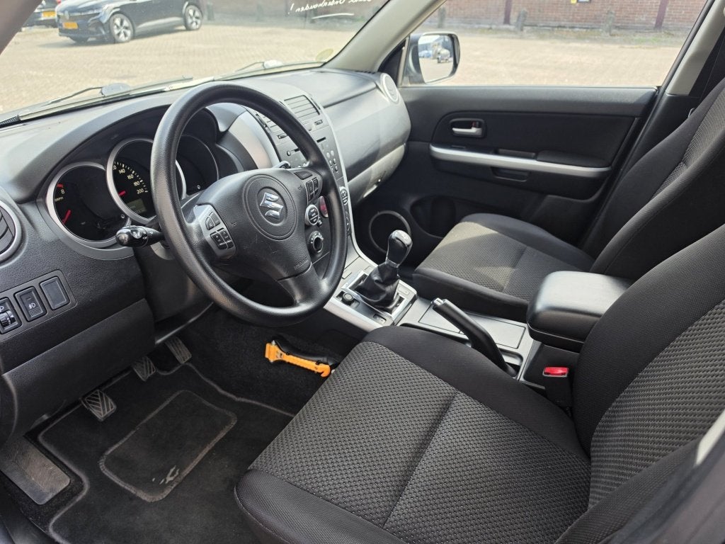 Suzuki Grand Vitara 2.0-16V Exclusive 4x4 Airco/Cruise ✅, Auto's, 4 cilinders, 1850 kg, Grand Vitara, Origineel Nederlands