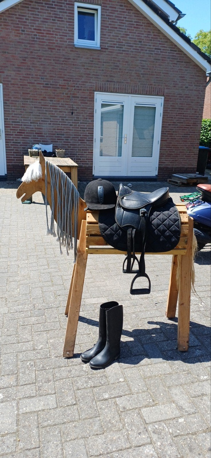 Paard van hout, Ophalen