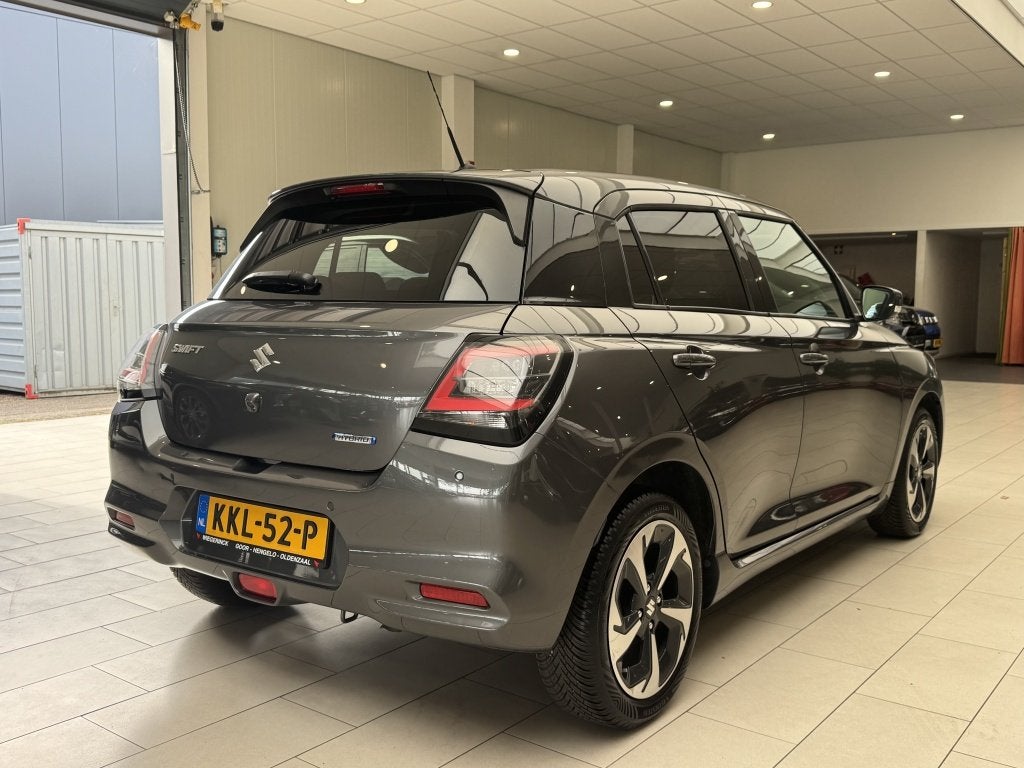 Suzuki Swift 1.2 Style Hybride [ ALL-SEASON I 100% DEALER OH, Auto's, Suzuki, 12 maanden, Stof, Gebruikt, Bedrijf