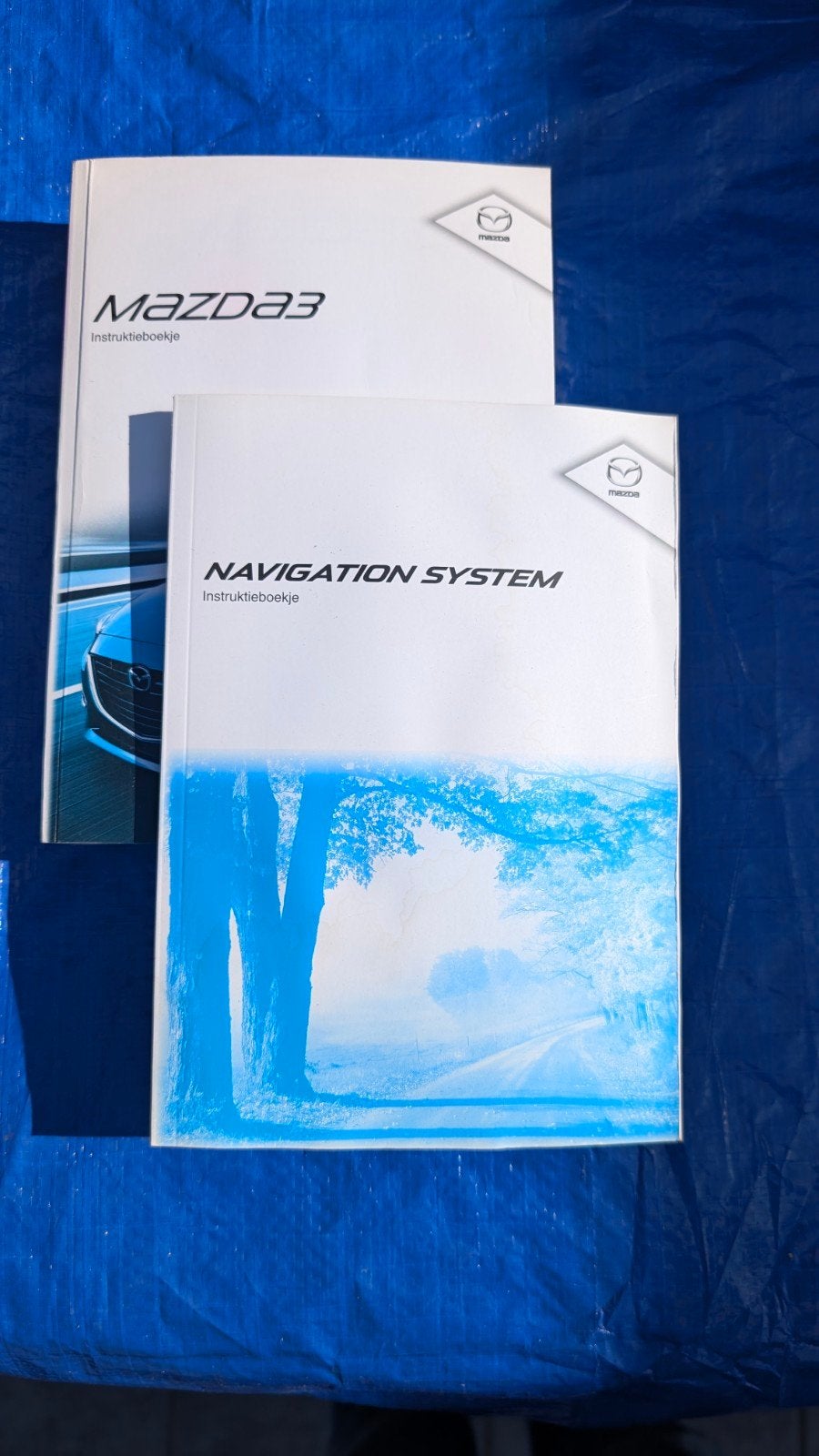 Mazda 3 Instructieboekje & Navigatiesysteem Handleiding, Auto diversen, Ophalen of Verzenden