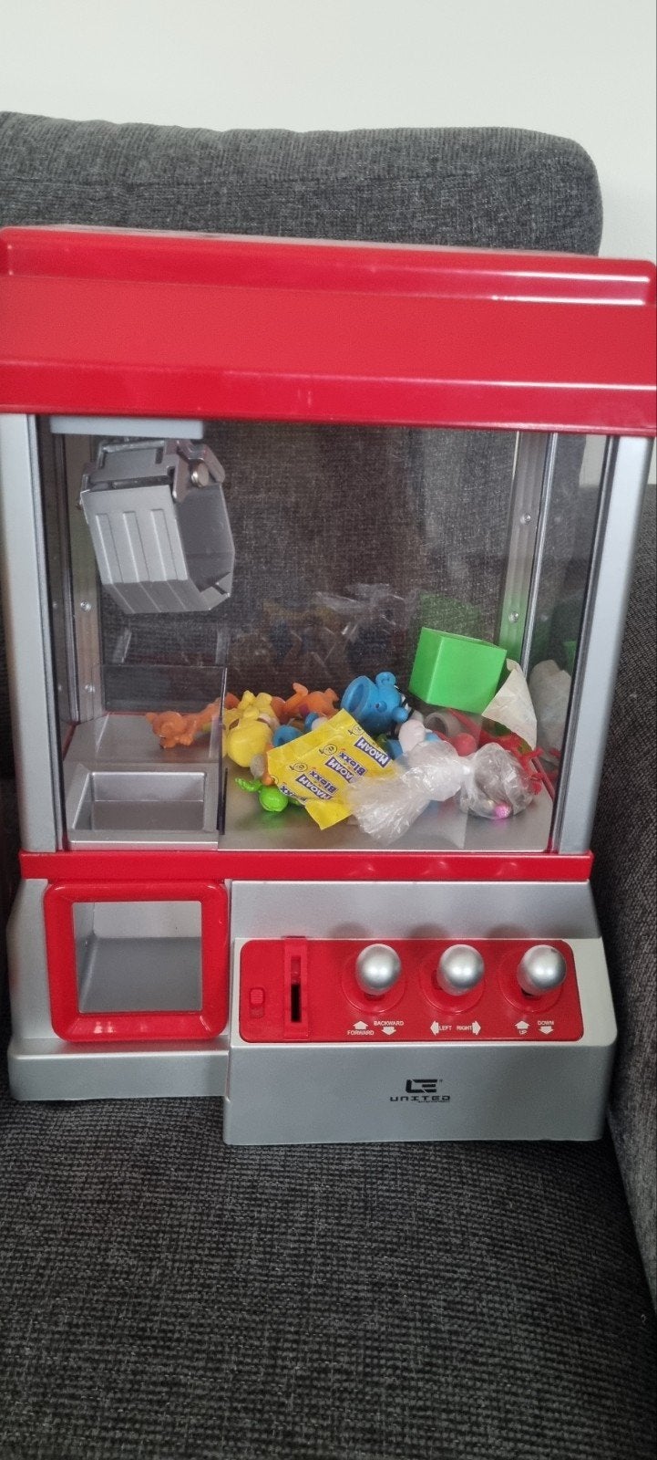 Grijpmachine met geluid en USB-oplader (deels defect), Ophalen of Verzenden