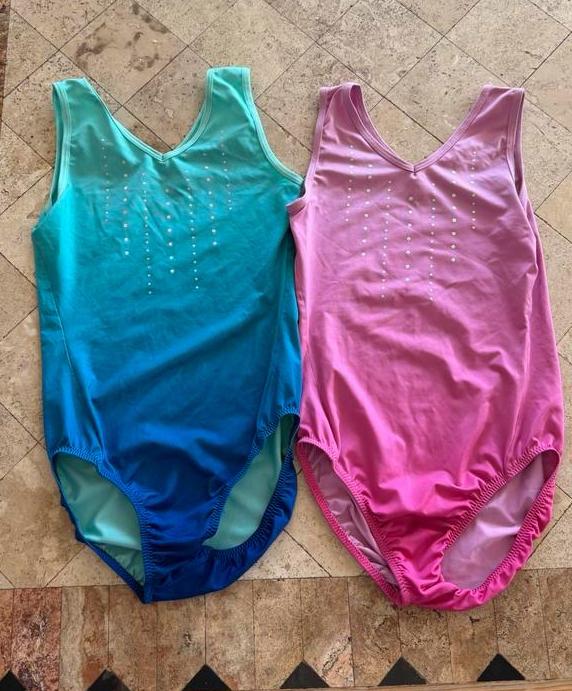 Turn acro pakjes maat 134 140 roze en blauw, Kindermaat 122 t/m 140, Ophalen of Verzenden, Zo goed als nieuw, Turnpak(je)