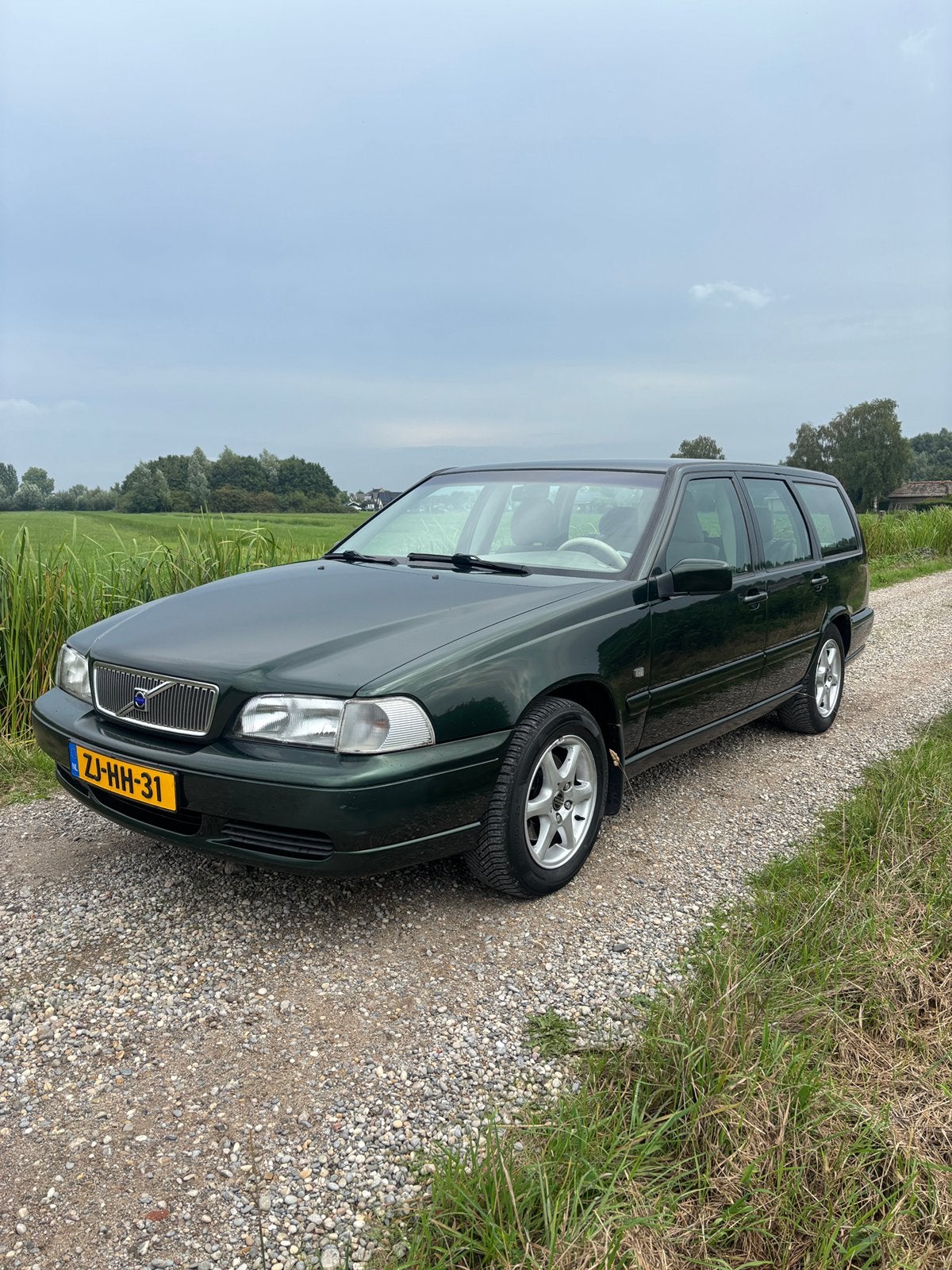 Volvo V70 2.5 10v 1999 Groen NWE APK, Voorwielaandrijving, Beige, Leder en Stof, 1425 kg