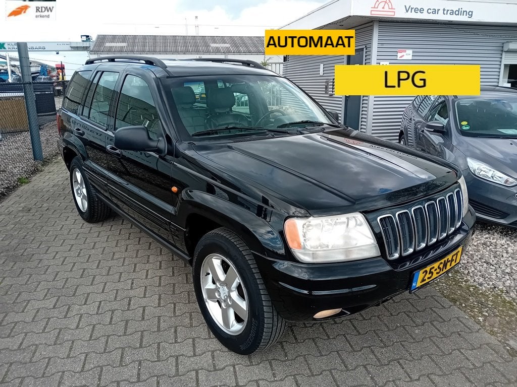 Jeep Grand Cherokee 4.0 I AUT BJ2001 LPG! NIEUWE APK!, Auto's, Automaat, Zwart, Met garantie (alle), 3360 kg