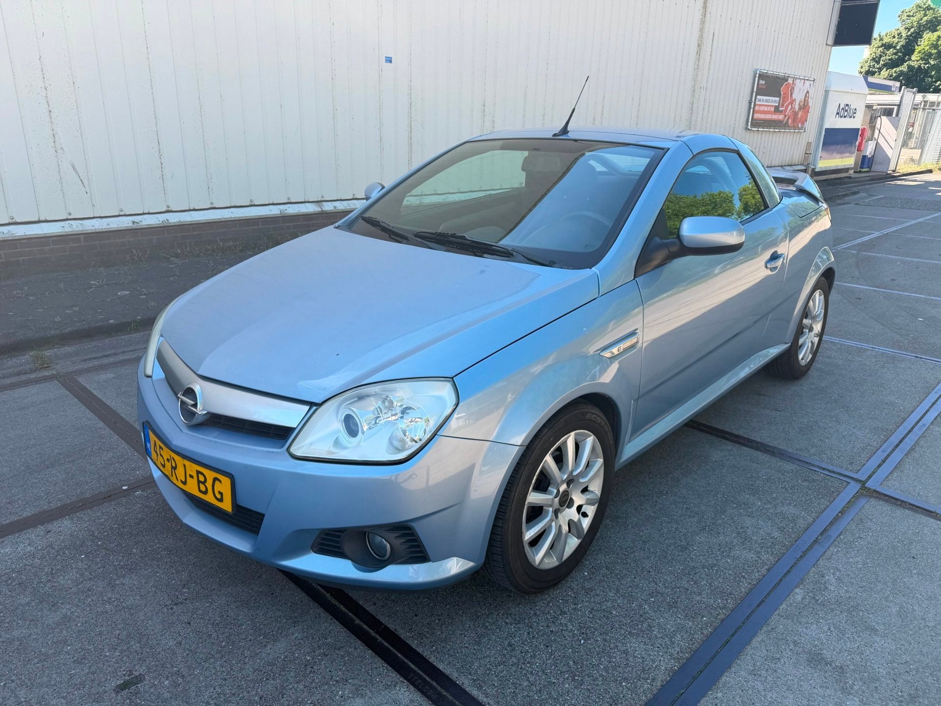 Opel Tigra TwinTop 1.8-16V Temptation niewe apk, Auto's, Opel, 125 pk, Gebruikt, 4 cilinders, Blauw