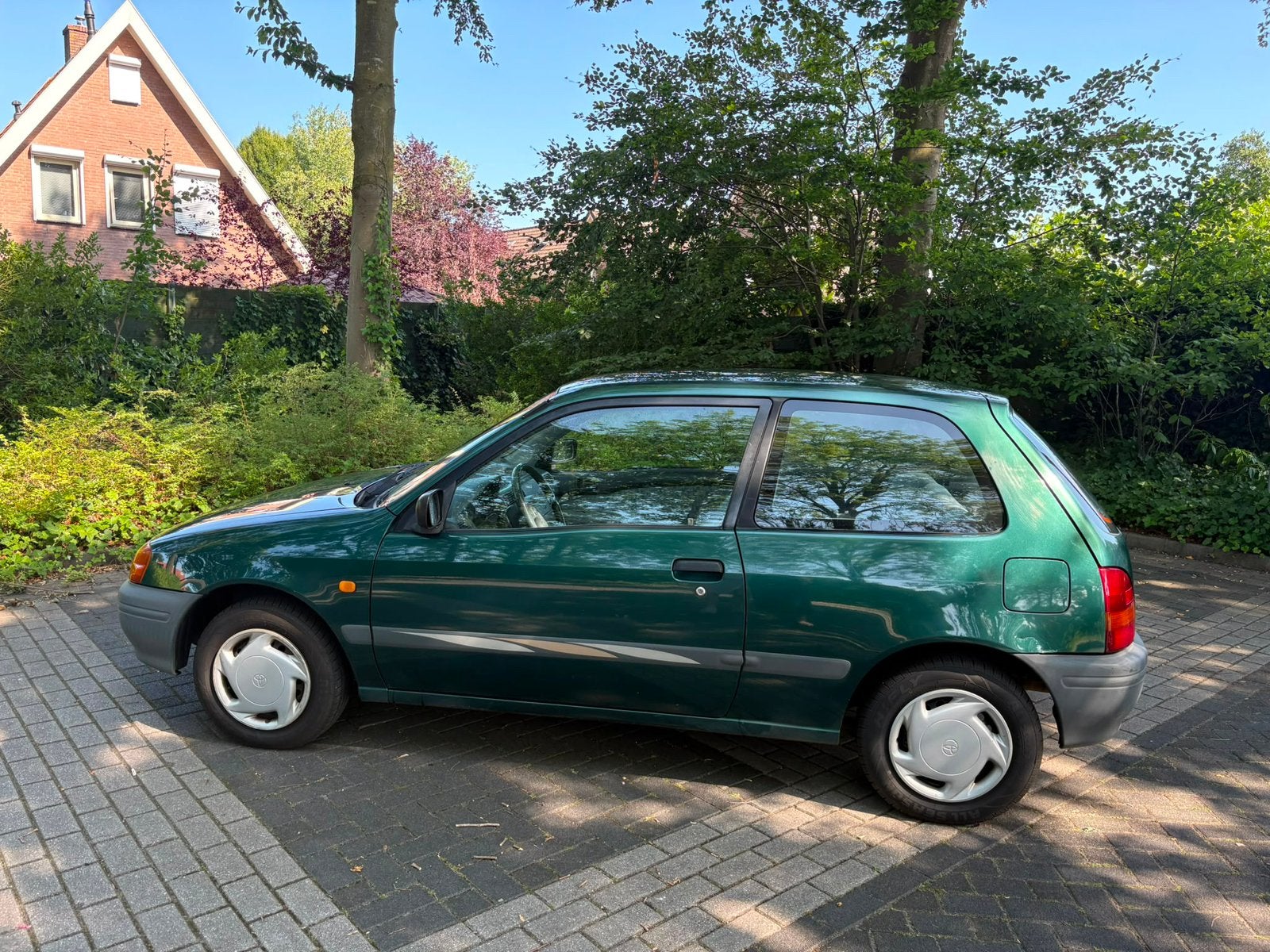 Toyota Starlet 1.3 16V 1997 Groen, Auto's, Toyota, Stof, 4 cilinders, Starlet, 400 kg