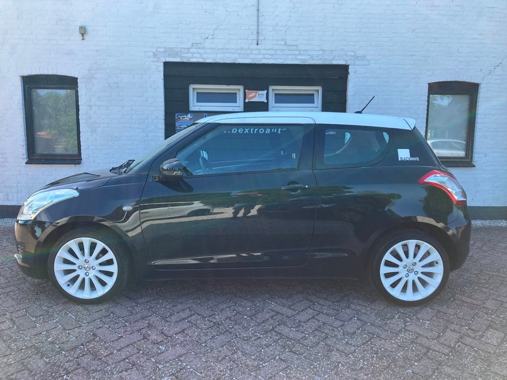 Suzuki Swift 1.2 16v BLACK en WHITE airco ZGAN 17"sportvelge, Auto's, 94 pk, Stof, Gebruikt, Origineel Nederlands