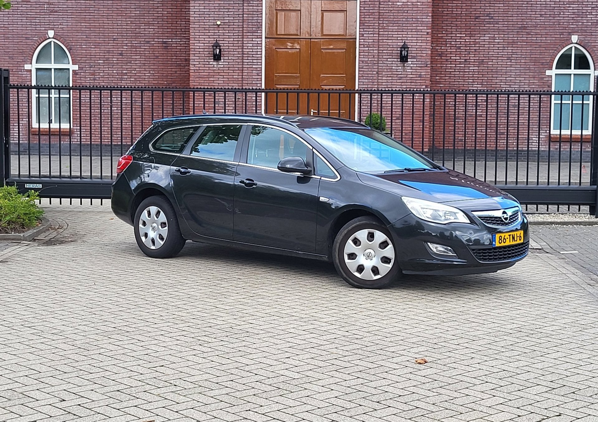 Opel Astra Sports Tourer 1.4 Business Edition / Airco / Navi, Voorwielaandrijving, 101 pk, Gebruikt, 4 cilinders