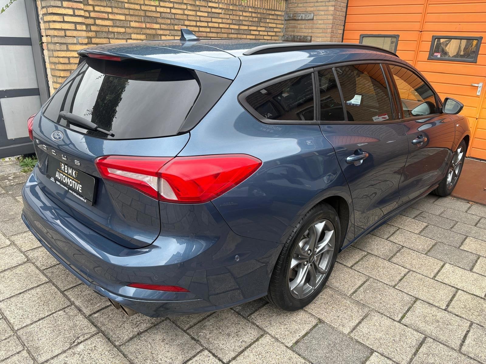 Ford Focus Wagon 1.5 EcoBoost ST Line Business, Auto's, 1345 kg, Stof, Zwart, 150 pk